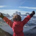 Anonymous kid celebrating success in mountains What Actually Leads To Success? Digital Resources