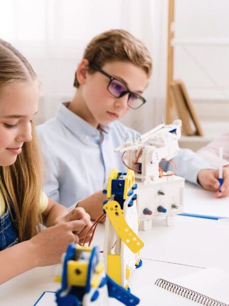 Schoolgirl making diy robot at stem lab Children and Robotics Donation Confirmation